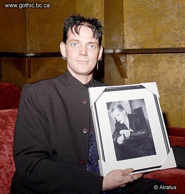 With his newly restored photo.