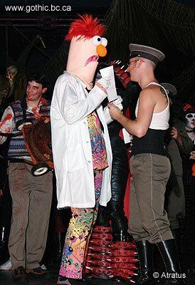 Beaker receives his prize from DJ Pyxis.