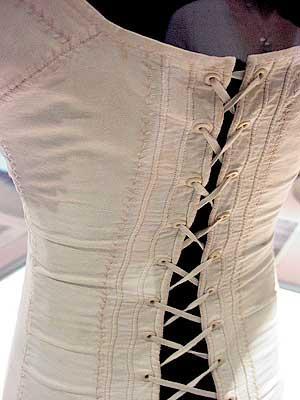 Hand-sewn 19th C. corset with ivory grommets.