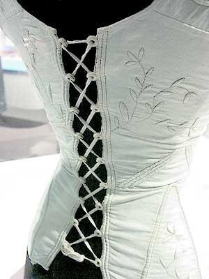 Hand-sewn 18th C. corset with ivory grommets.
