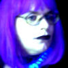 Felicity’s faux-pearl necklace glows blue in the light at Rodaos on New Year’s Eve