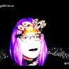 Felicity unsuccessfully tries to wear the New Year’s tiara.